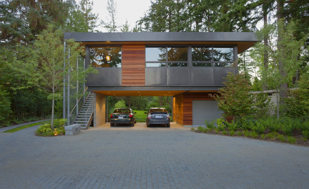 Photo of a contemporary exterior in Seattle with wood siding.