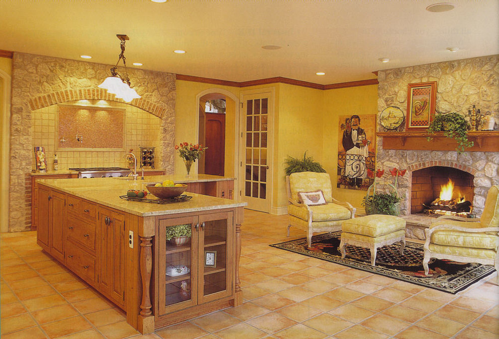 Large elegant l-shaped ceramic tile eat-in kitchen photo in Detroit with an undermount sink, medium tone wood cabinets, granite countertops, stone tile backsplash, paneled appliances and an island