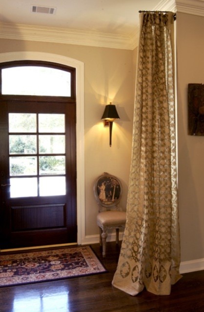 Example of a mid-sized transitional front door design