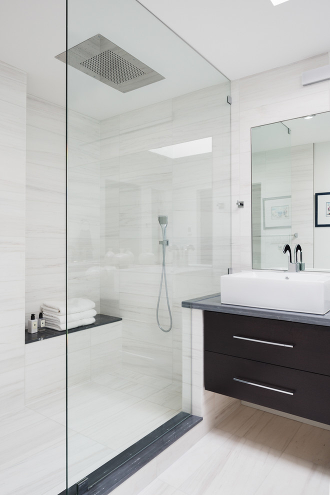 Design ideas for a mid-sized contemporary master bathroom in Vancouver with flat-panel cabinets, white tile, stone tile, marble floors, marble benchtops, white floor, a vessel sink, an open shower, black cabinets, a corner shower and white walls.