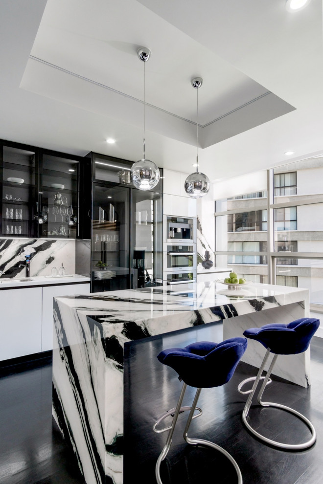 Inspiration for a large modern eat-in kitchen in Los Angeles with flat-panel cabinets and with island.
