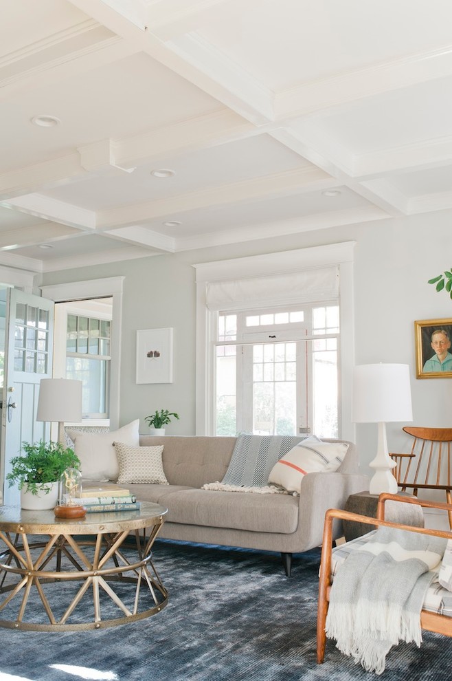Inspiration for a transitional living room in Minneapolis with white walls.