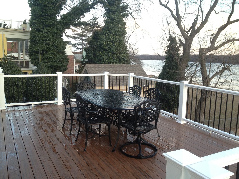 Mid-sized traditional backyard deck in Philadelphia.
