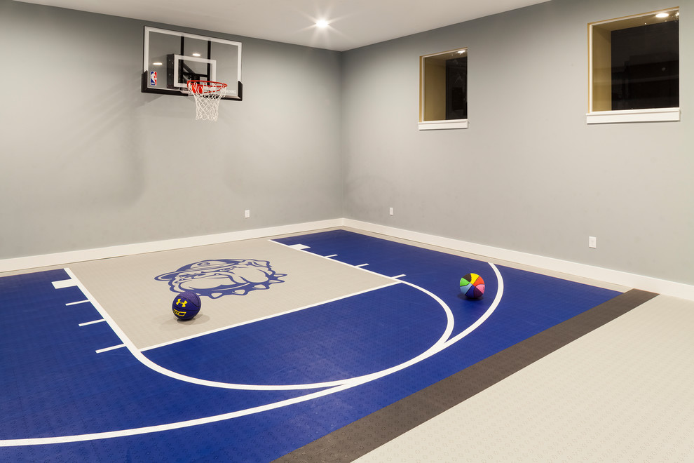 Photo of a large transitional indoor sport court in Baltimore with grey walls and multi-coloured floor.