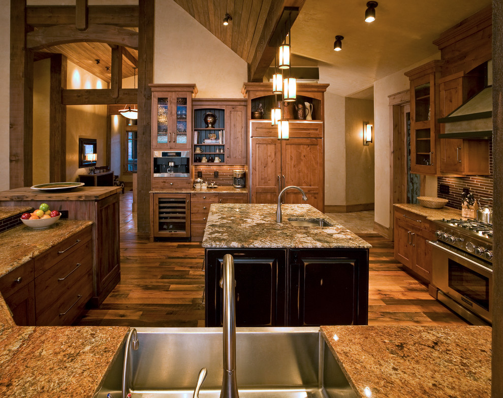 Photo of a traditional kitchen in Denver with panelled appliances and granite benchtops.