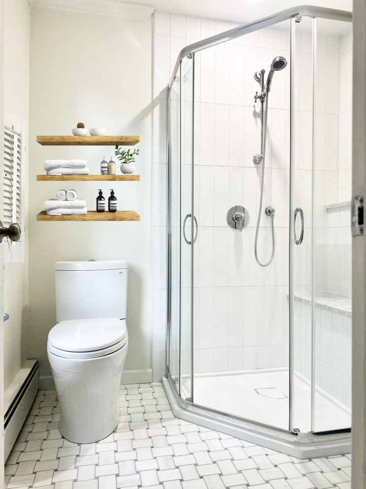 Small transitional 3/4 white tile marble floor, gray floor and single-sink corner shower photo in Boston with gray cabinets, a two-piece toilet, quartz countertops, white countertops and a built-in vanity