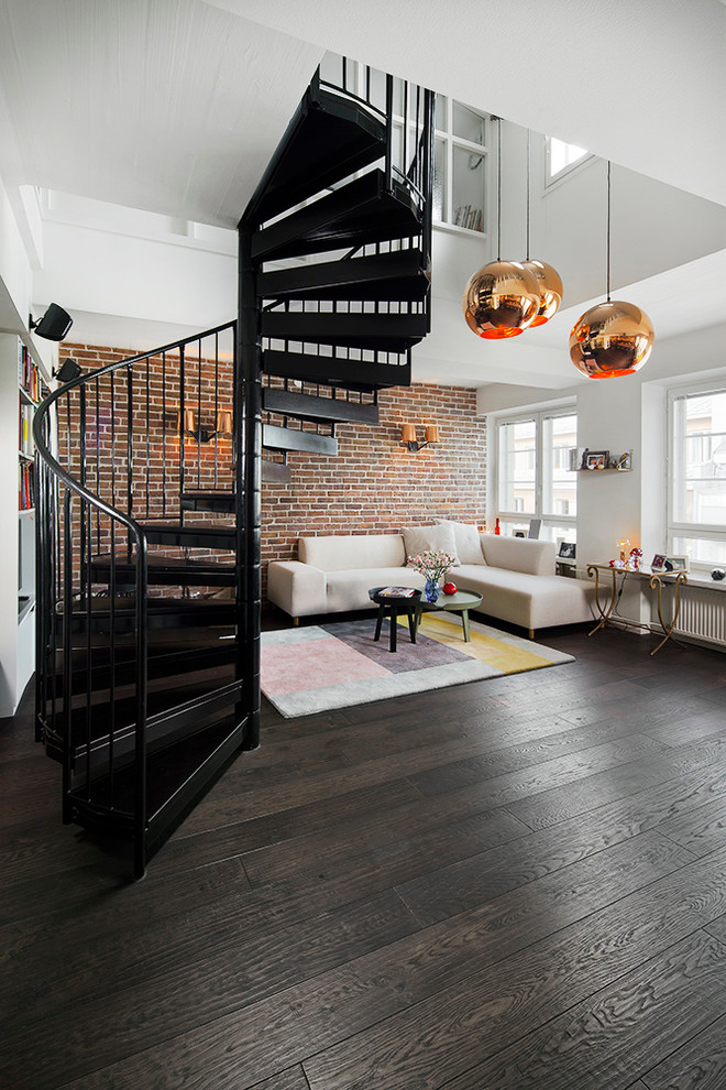 Design ideas for a large contemporary metal spiral staircase in Stockholm with metal risers.
