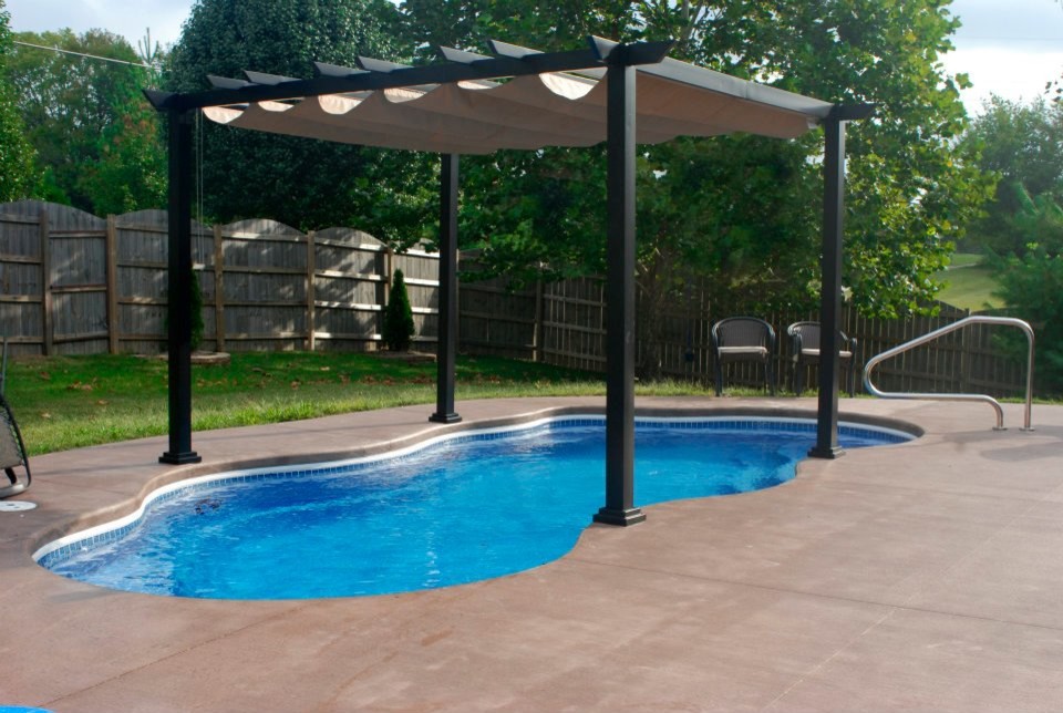 Pool - mid-sized backyard custom-shaped pool idea in Indianapolis