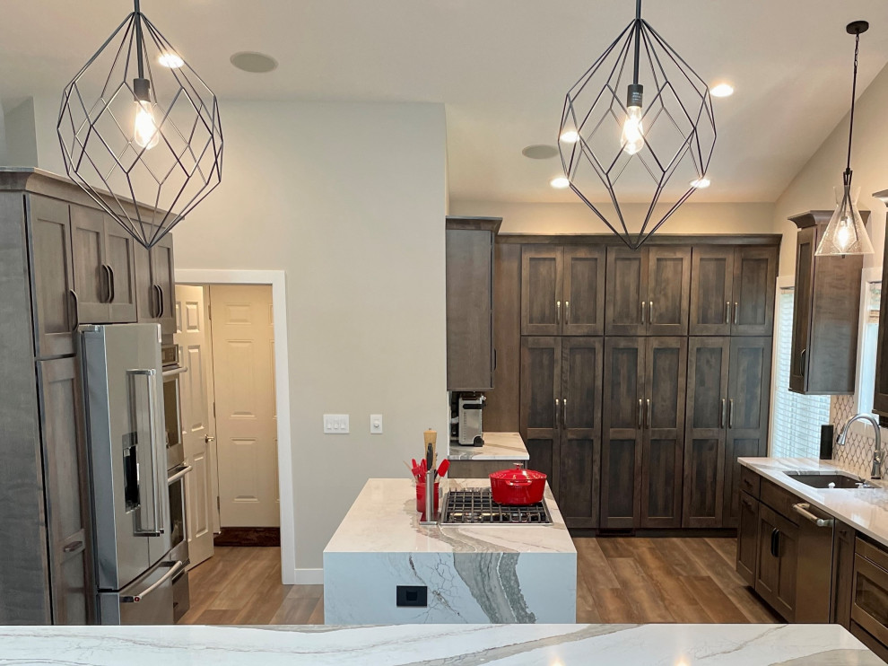 Two Island Kitchen with Gray Stain and Waterfall Counters ...