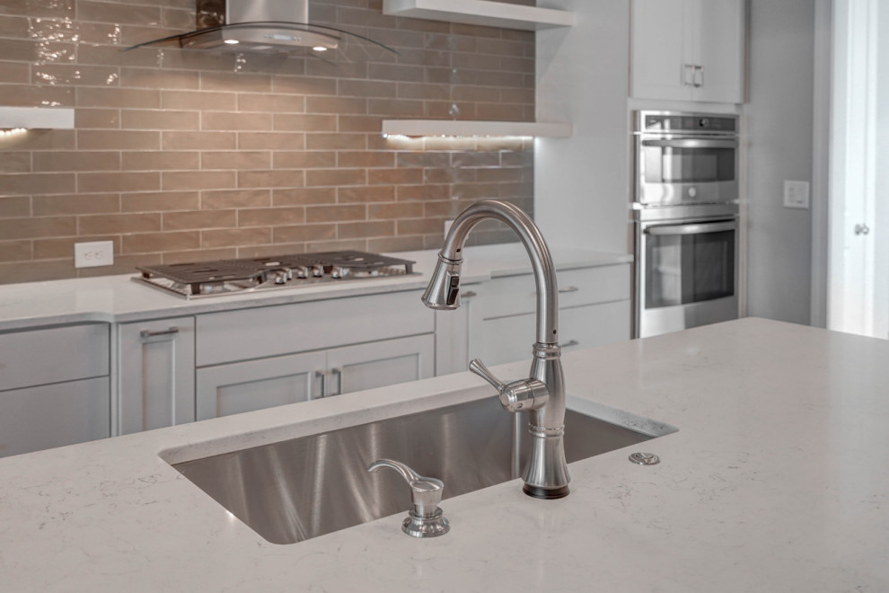 Example of a transitional kitchen design in Charlotte