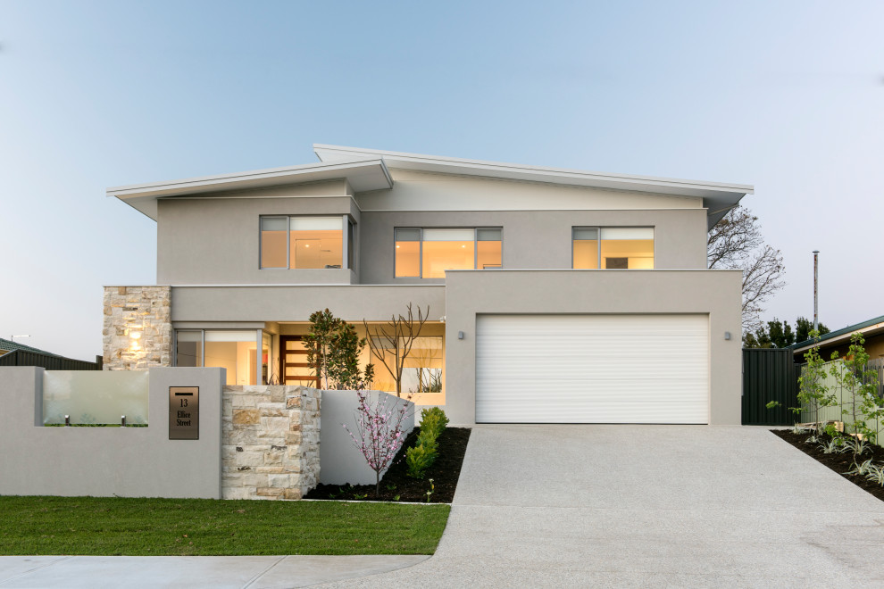 Trendy gray two-story house exterior photo in Perth with a metal roof and a gray roof