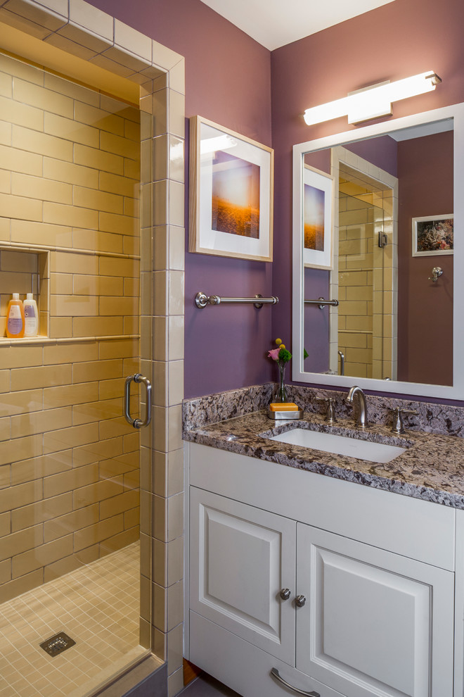 This is an example of a small traditional 3/4 bathroom in Austin with raised-panel cabinets, white cabinets, an alcove shower, yellow tile, ceramic tile, purple walls, slate floors, an undermount sink, granite benchtops, beige floor and a hinged shower door.