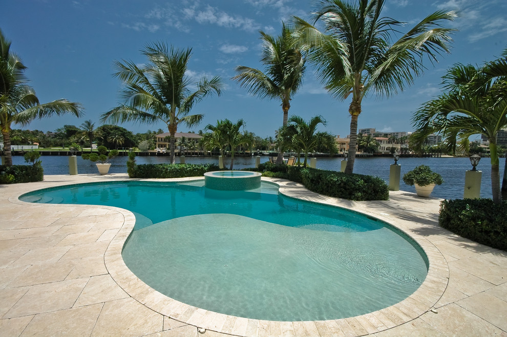 Mediterranean custom-shaped pool in Miami.