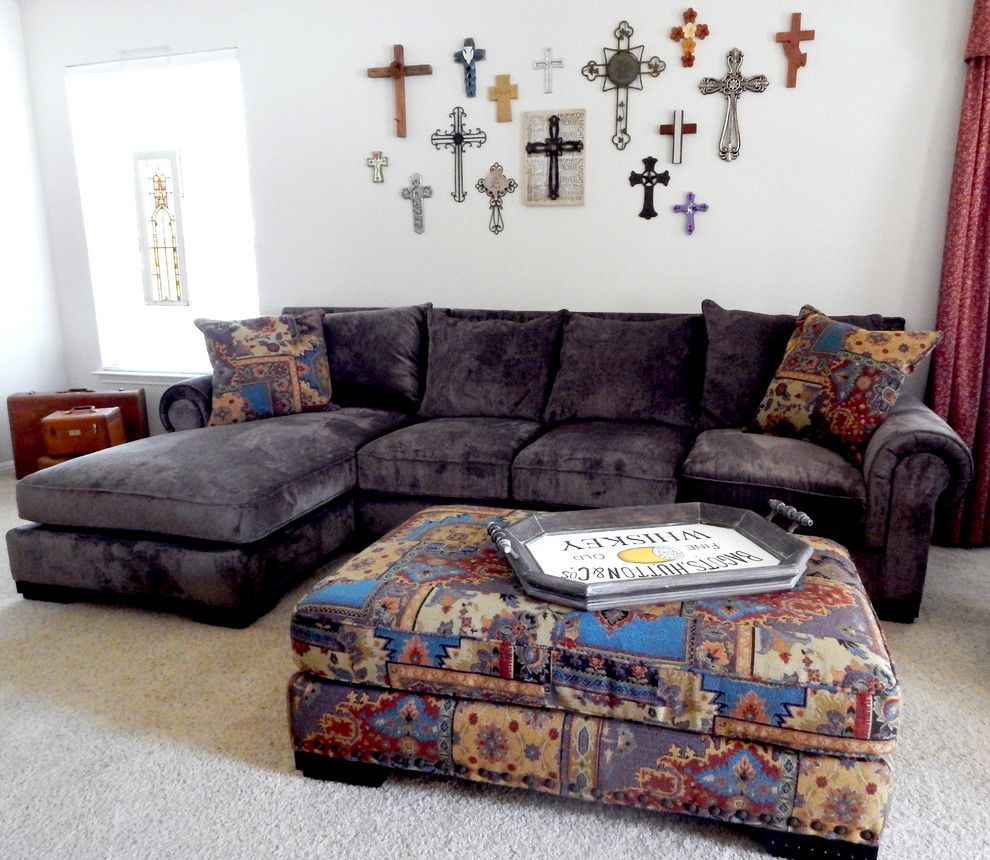 Photo of a mid-sized enclosed family room in Austin with white walls and carpet.