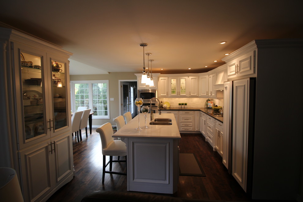 Example of a transitional kitchen design in Toronto