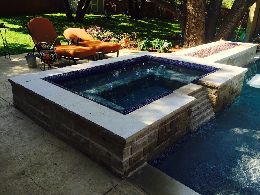 Hot tub - small transitional backyard stamped concrete and rectangular lap hot tub idea in Dallas