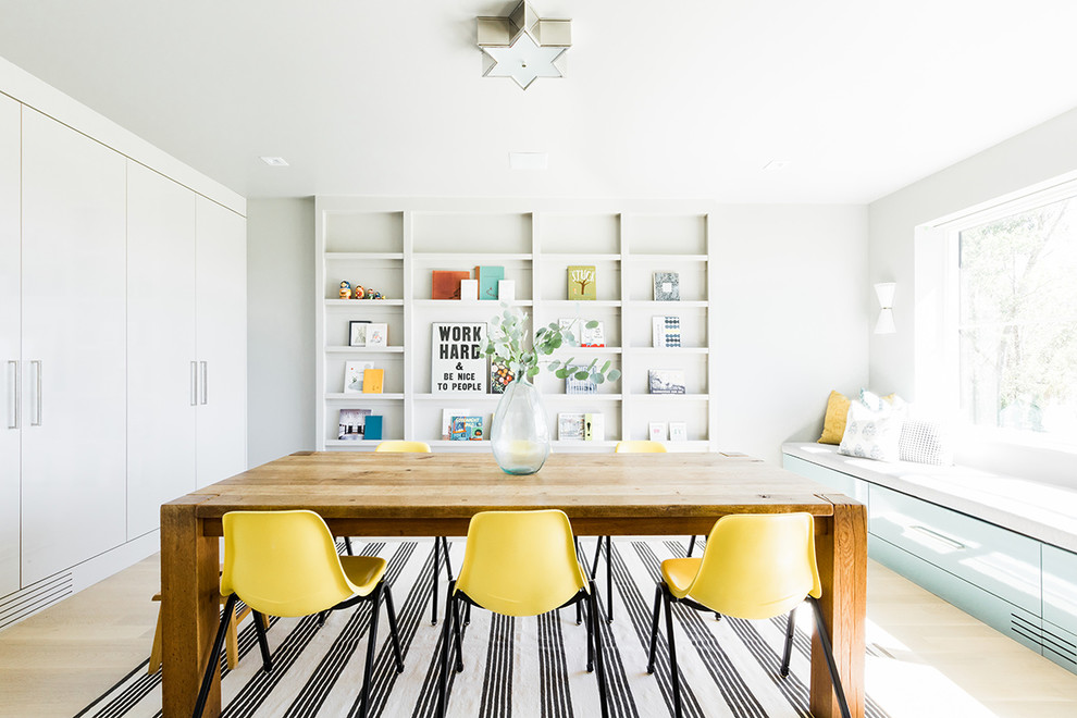 Trendy light wood floor and beige floor kids' study room photo in Salt Lake City with gray walls