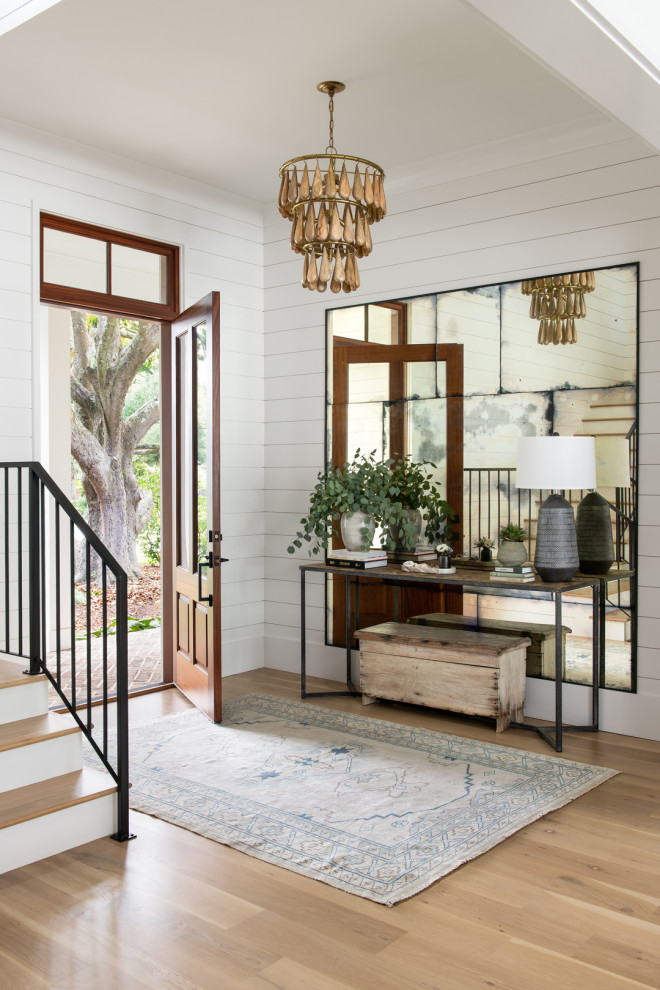 This is an example of a beach style entryway in Charleston.