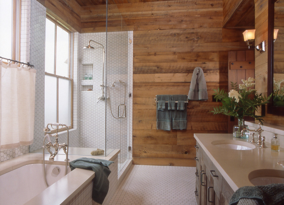 Inspiration for a mid-sized rustic master white tile and porcelain tile porcelain tile corner shower remodel in Denver with an undermount sink, shaker cabinets, gray cabinets, an undermount tub and brown walls
