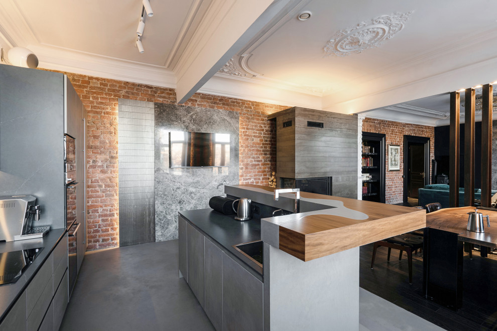 Example of a huge urban dark wood floor, exposed beam and brick wall kitchen/dining room combo design in Saint Petersburg with black walls, a corner fireplace and a tile fireplace
