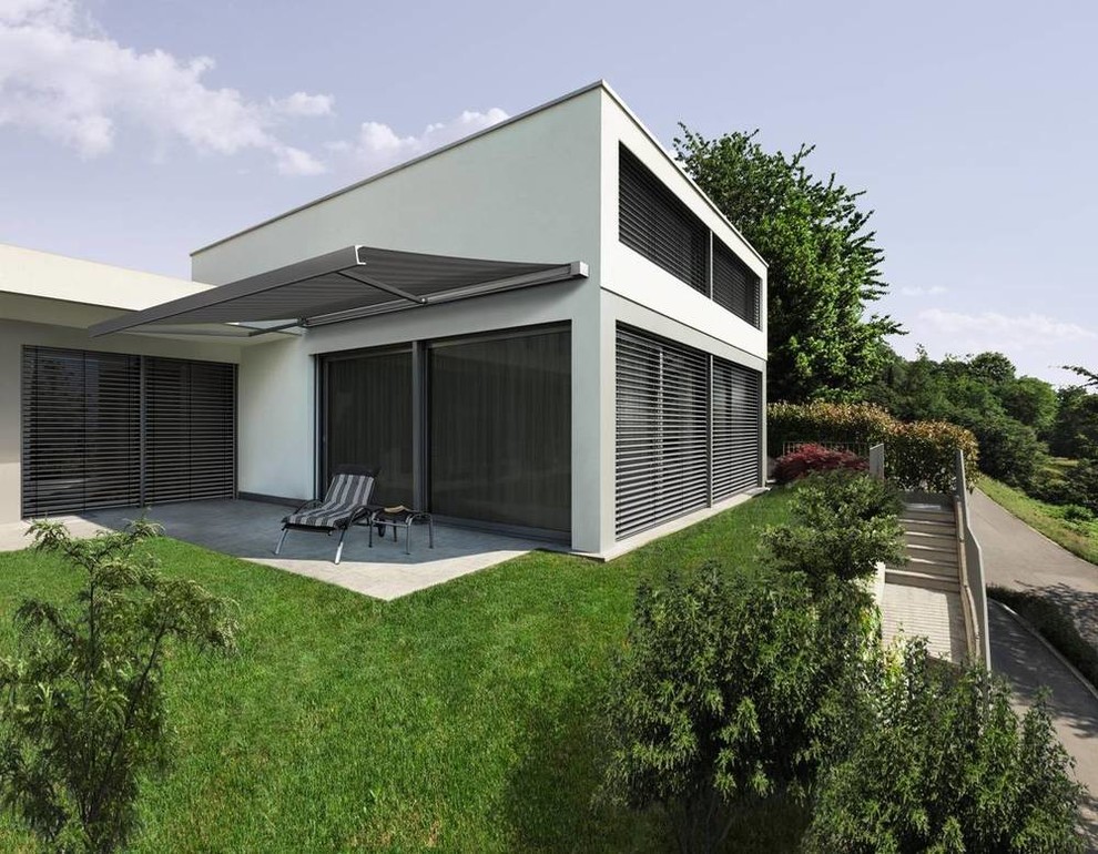 Inspiration for a contemporary deck in Berlin with an awning.