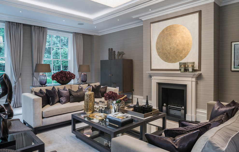 Inspiration for a mid-sized contemporary formal enclosed living room in Berkshire with grey walls, carpet, a standard fireplace, a plaster fireplace surround and beige floor.