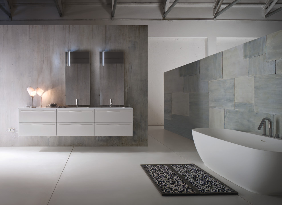 Inspiration for a small modern 3/4 bathroom in San Diego with an integrated sink, flat-panel cabinets, grey cabinets, recycled glass benchtops, a freestanding tub, a corner shower, a one-piece toilet, white tile, ceramic tile, grey walls and ceramic floors.