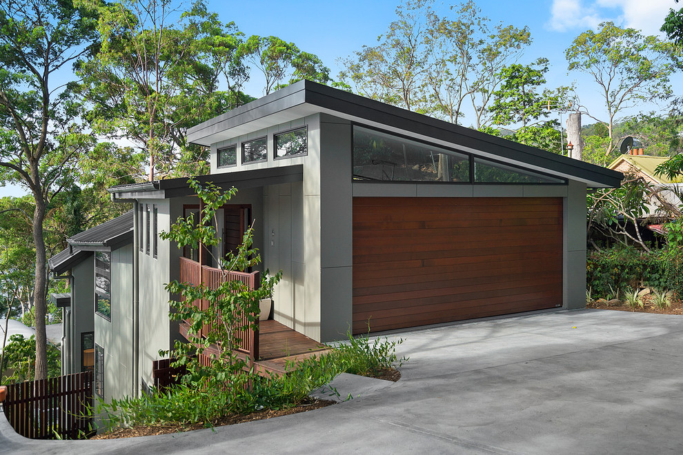 Mid-sized contemporary attached two-car carport in Sunshine Coast.