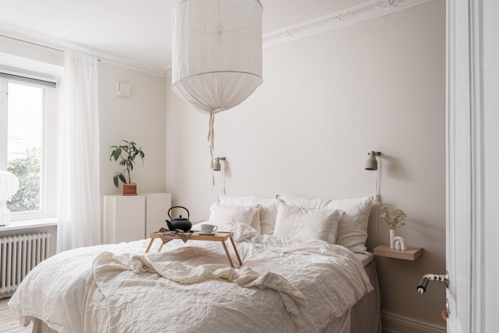 Example of a danish bedroom design in Other