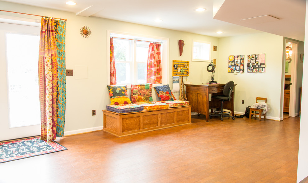 This is an example of a mid-sized eclectic basement in DC Metro.