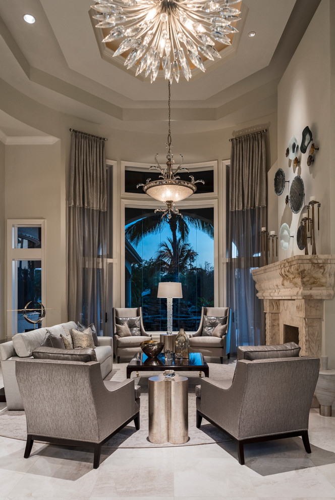 Inspiration for a mid-sized transitional formal open concept living room in Miami with grey walls, porcelain floors, a two-sided fireplace, a stone fireplace surround, no tv and multi-coloured floor.