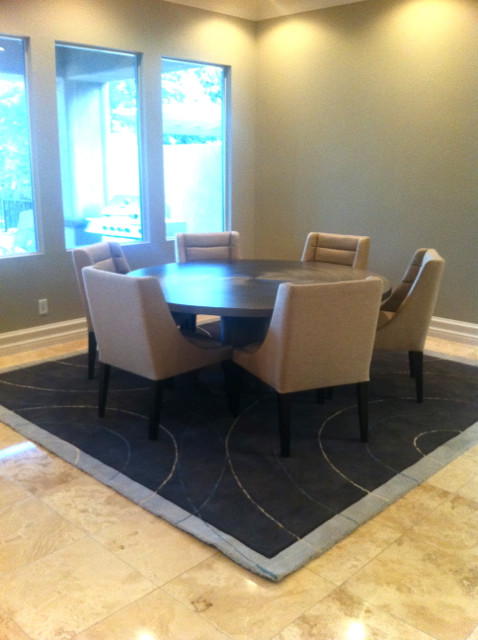 Photo of a mid-sized contemporary separate dining room in Las Vegas with brown walls, travertine floors and beige floor.