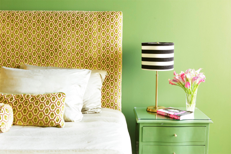 Design ideas for a mid-sized eclectic guest bedroom in Los Angeles with green walls.