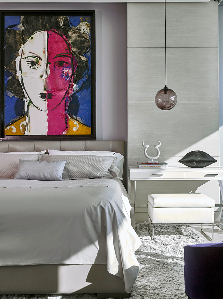 This is an example of a contemporary bedroom in Miami with grey walls.