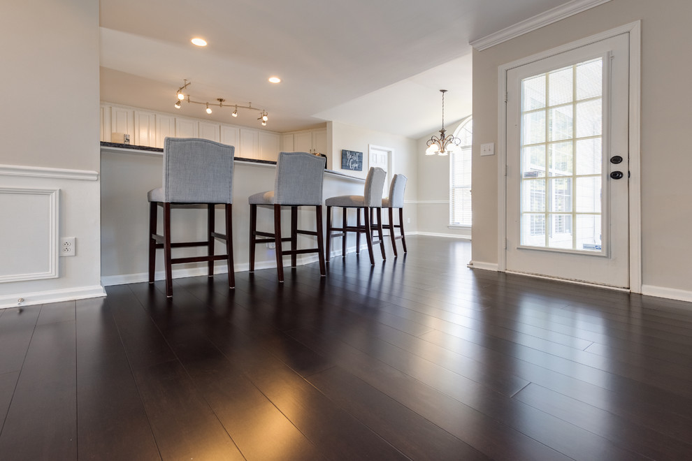 Bamboo floor and brown floor kitchen photo in Charlotte