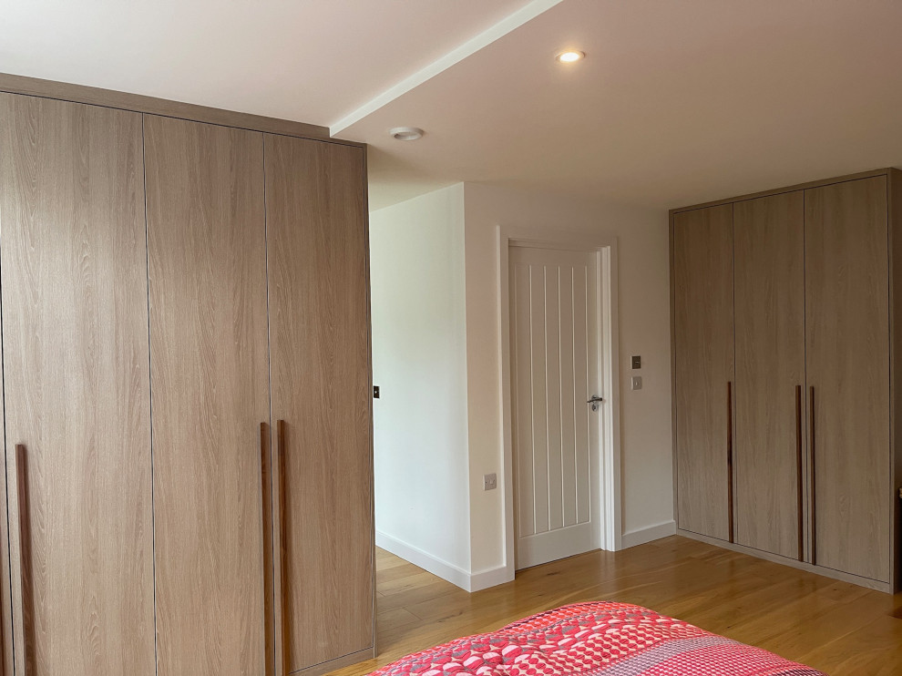 Bespoke Wardrobes and Custom Shelving Solutions with Routed Wooden Handles