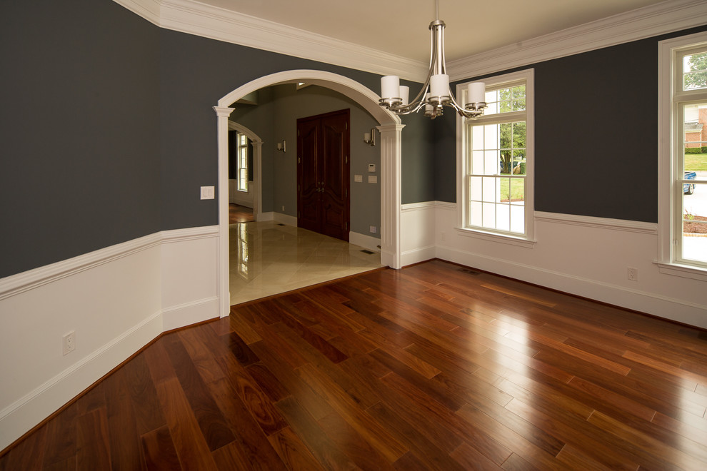 Large transitional dining room in DC Metro with medium hardwood floors.