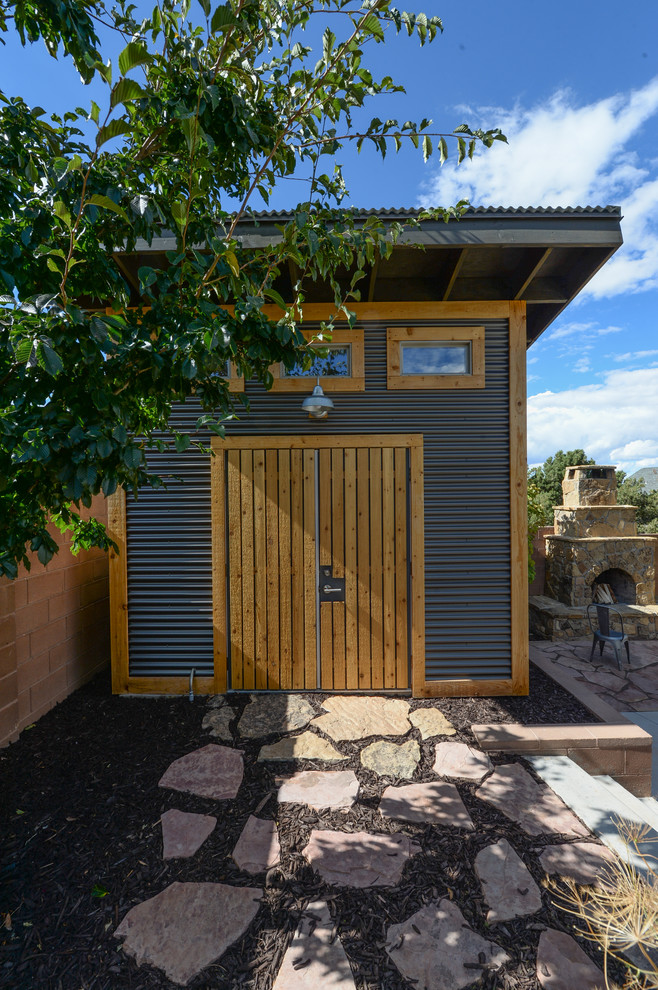 This is an example of a mid-sized contemporary detached garden shed in Orange County.