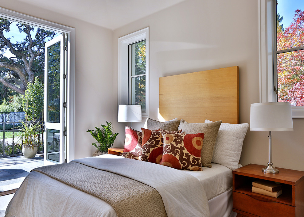 Transitional bedroom in San Francisco with beige walls.