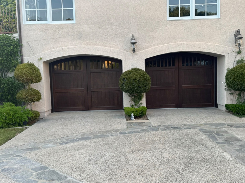 Example of a transitional garage design in Orange County