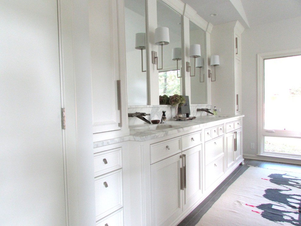 Design ideas for a large contemporary master bathroom in New Orleans with recessed-panel cabinets, white cabinets, an undermount tub, an alcove shower, a two-piece toilet, white walls, dark hardwood floors, an undermount sink and marble benchtops.