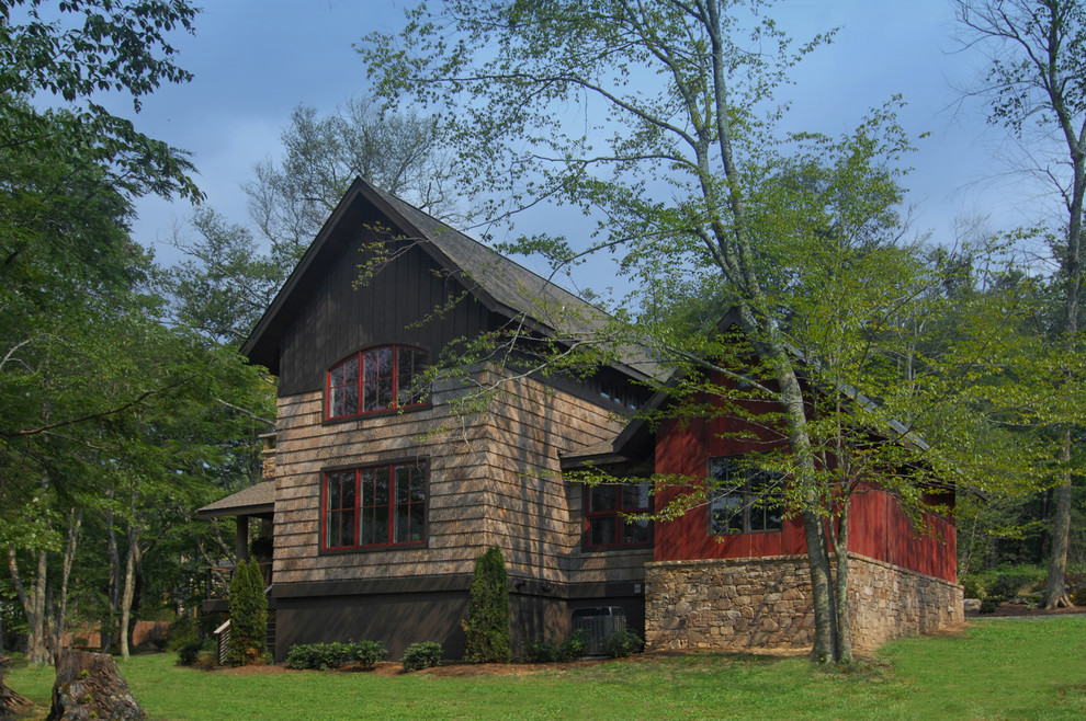 Photo of a country exterior in Charlotte with stone veneer.