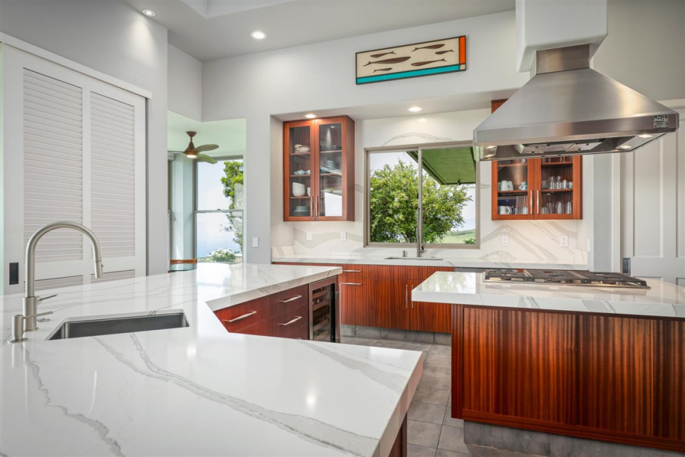 This is an example of a large beach style kitchen in Hawaii.