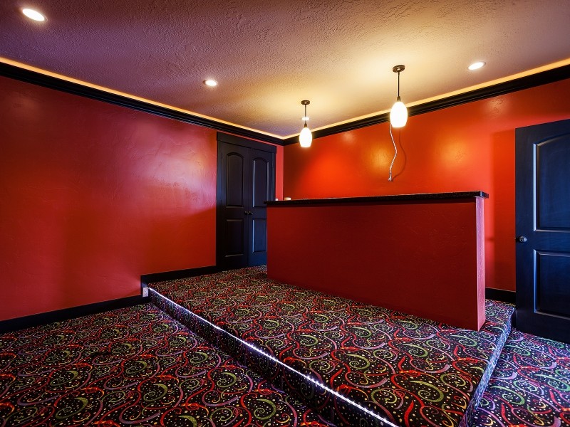 Photo of a large arts and crafts open concept home theatre in Salt Lake City.