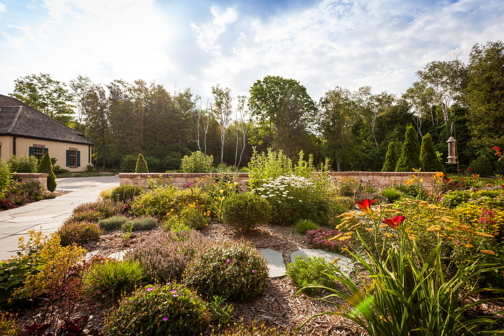 Design ideas for a large rustic full sun front yard landscaping.