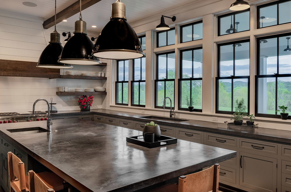 Design ideas for a large country kitchen in New York with a single-bowl sink, shaker cabinets, grey cabinets, concrete benchtops, white splashback, timber splashback, stainless steel appliances, dark hardwood floors, with island, brown floor and black benchtop.