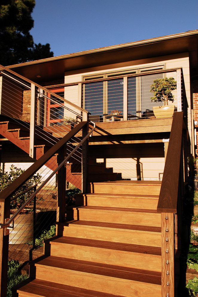 This is an example of a mid-sized contemporary deck in San Francisco with no cover.