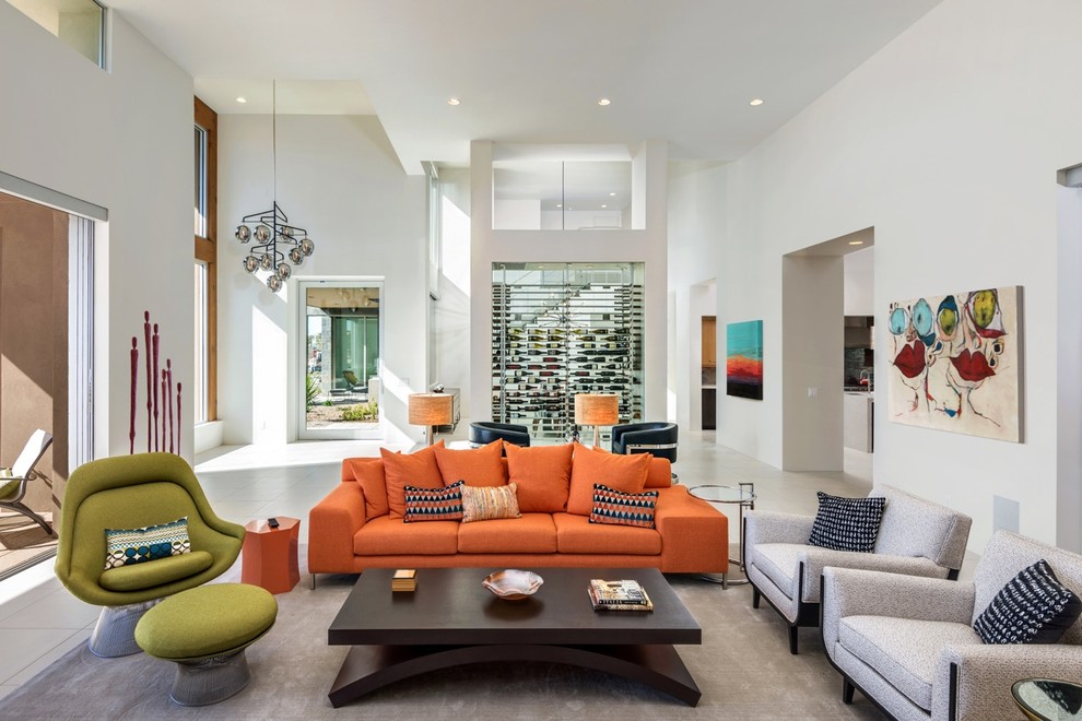 Large contemporary open concept living room in Phoenix with white walls and porcelain floors.