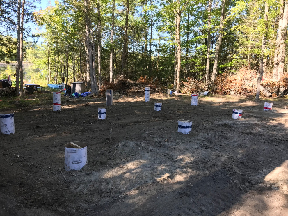 Placing and backfilling around sonotubes.