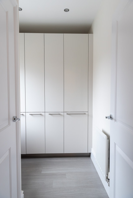 Rotpunkt Lacquered Stone and Fenix Blue contemporary-utility-room